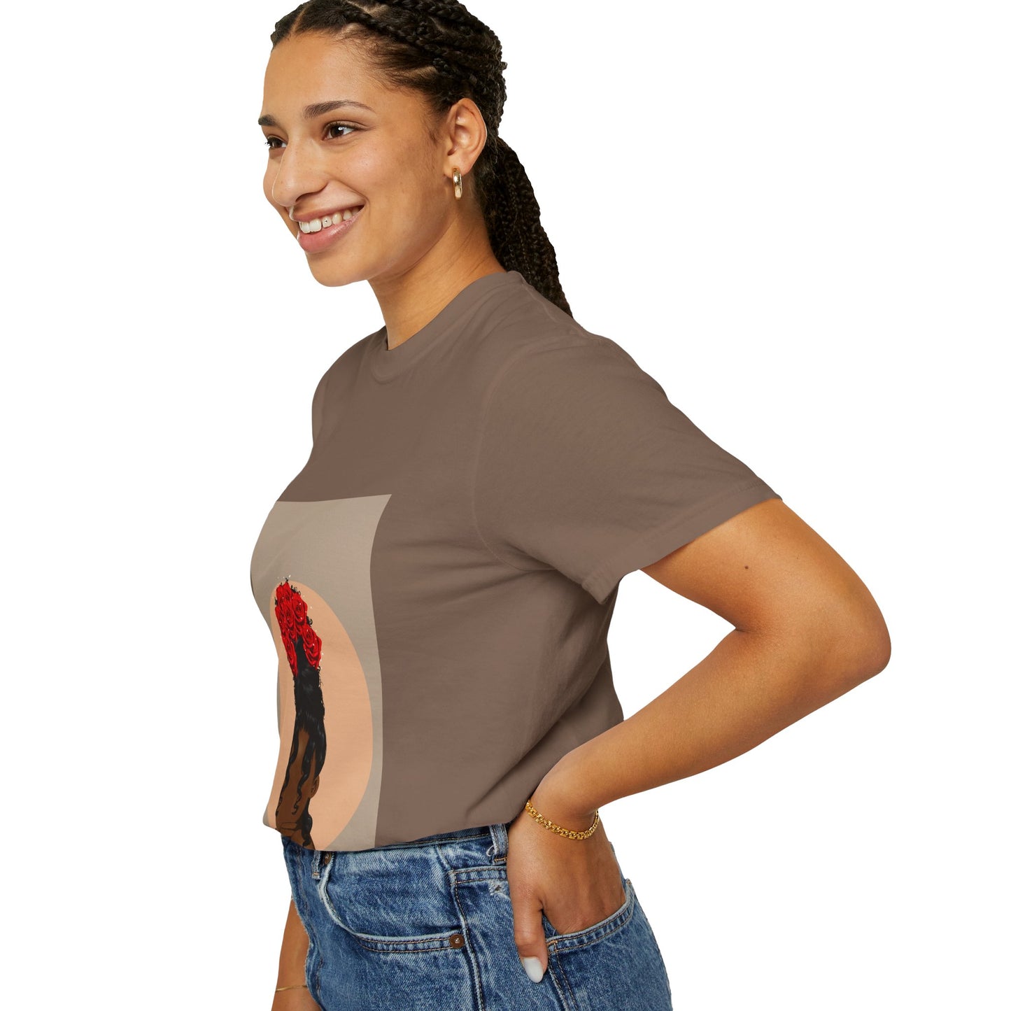 Model smiling in a stylish tee with bold feminine illustration—Black woman’s profile with red rose crown, designed by Fleur De Tiff.