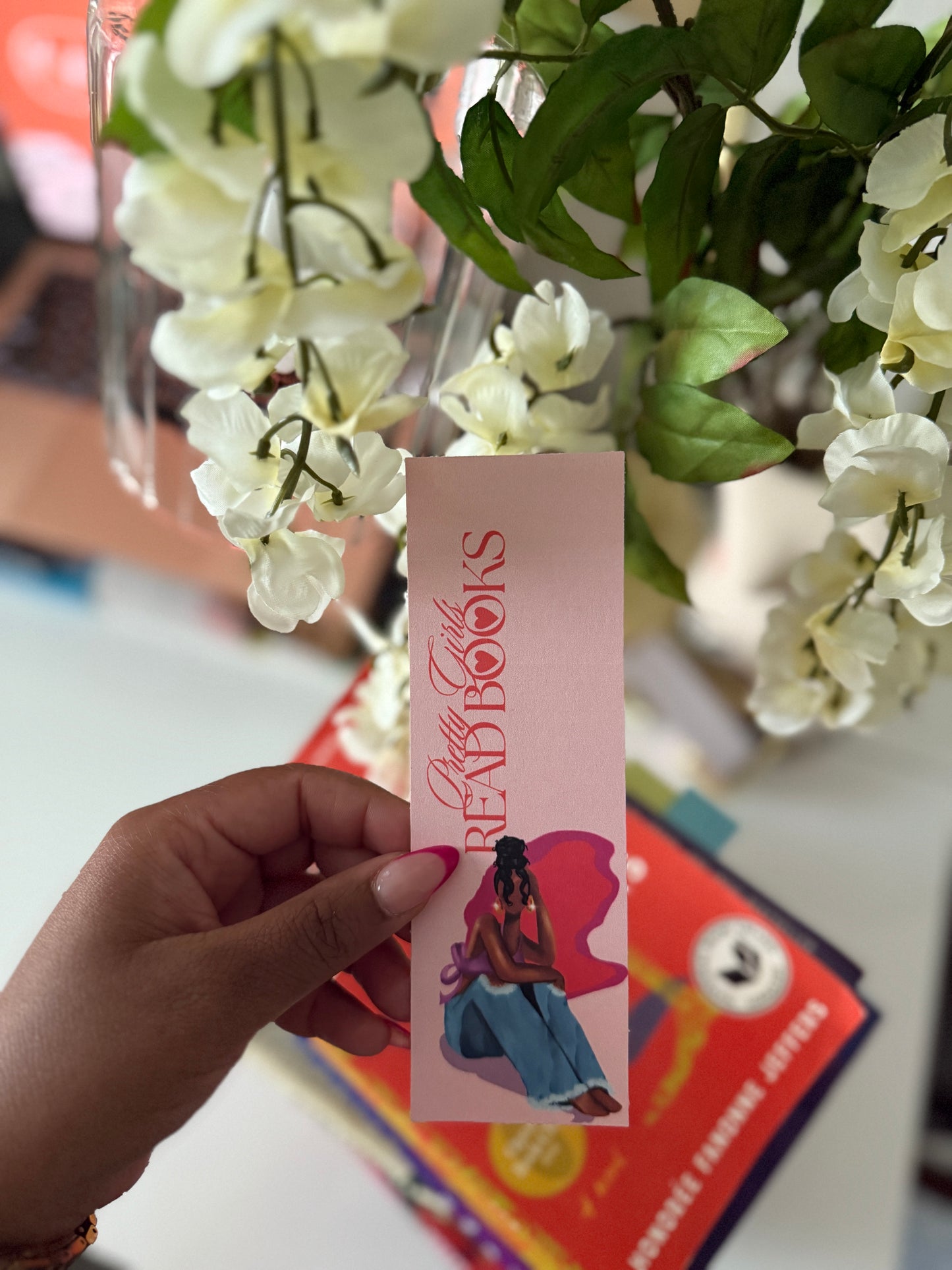 colorful feminine cute black girl art on a laminated bookmark